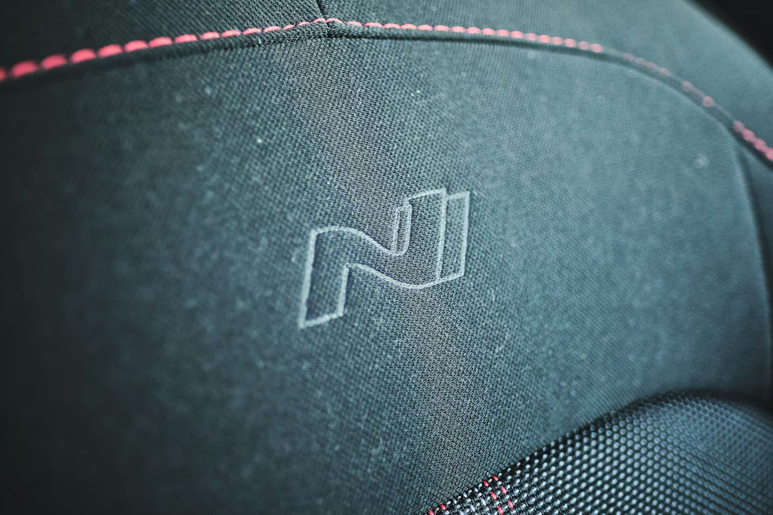 Professional embroidery work on custom dash covers with high-quality thread detail