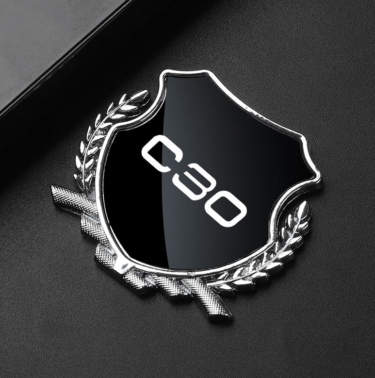Black side fender and window badge decals for Volvo S40 cars.