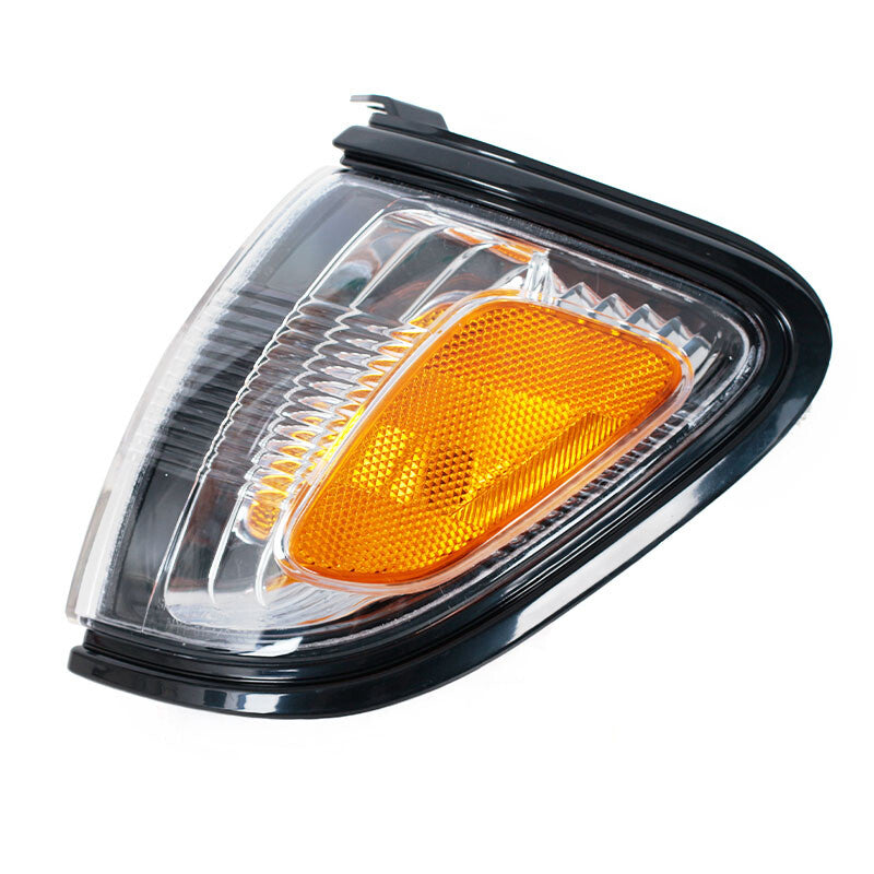 A pair of front bumper turn indicators without bulbs for Toyota Tacoma 2001-2004 LHRH models.