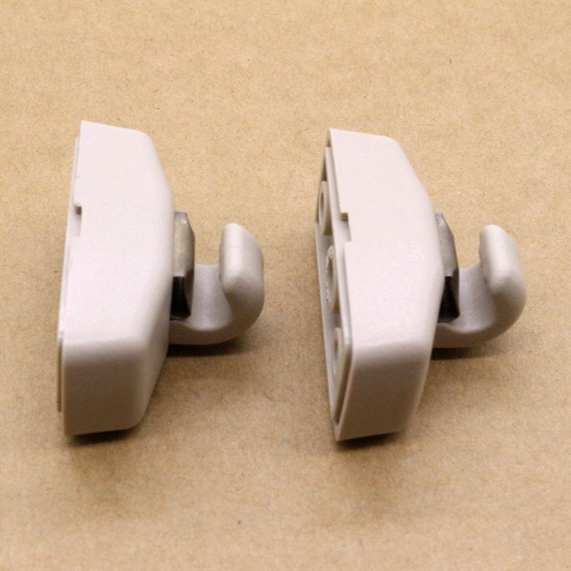 Two beige sun visor clip kits for Volkswagen for Jetta , for Golf , for Passat , Beetle, and for Skoda .