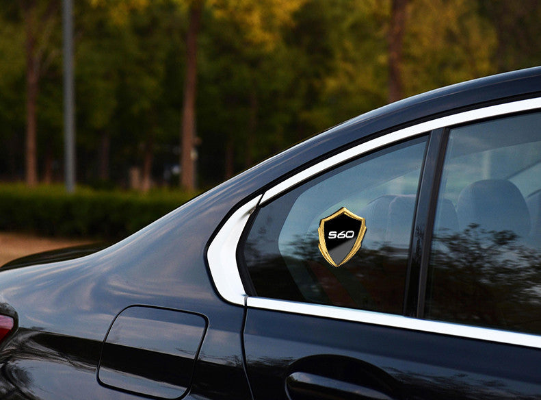 Carbon-plated side fender and window badge stickers for Volvo S80 cars.