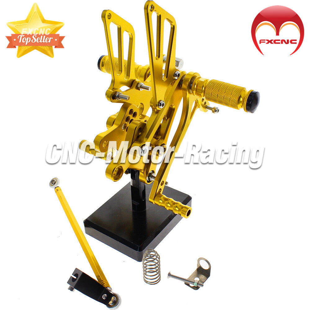 Adjustable rear wheel assembly with spikes and footrests suitable for CBR600F F4I 2001-2007 CNC machines.