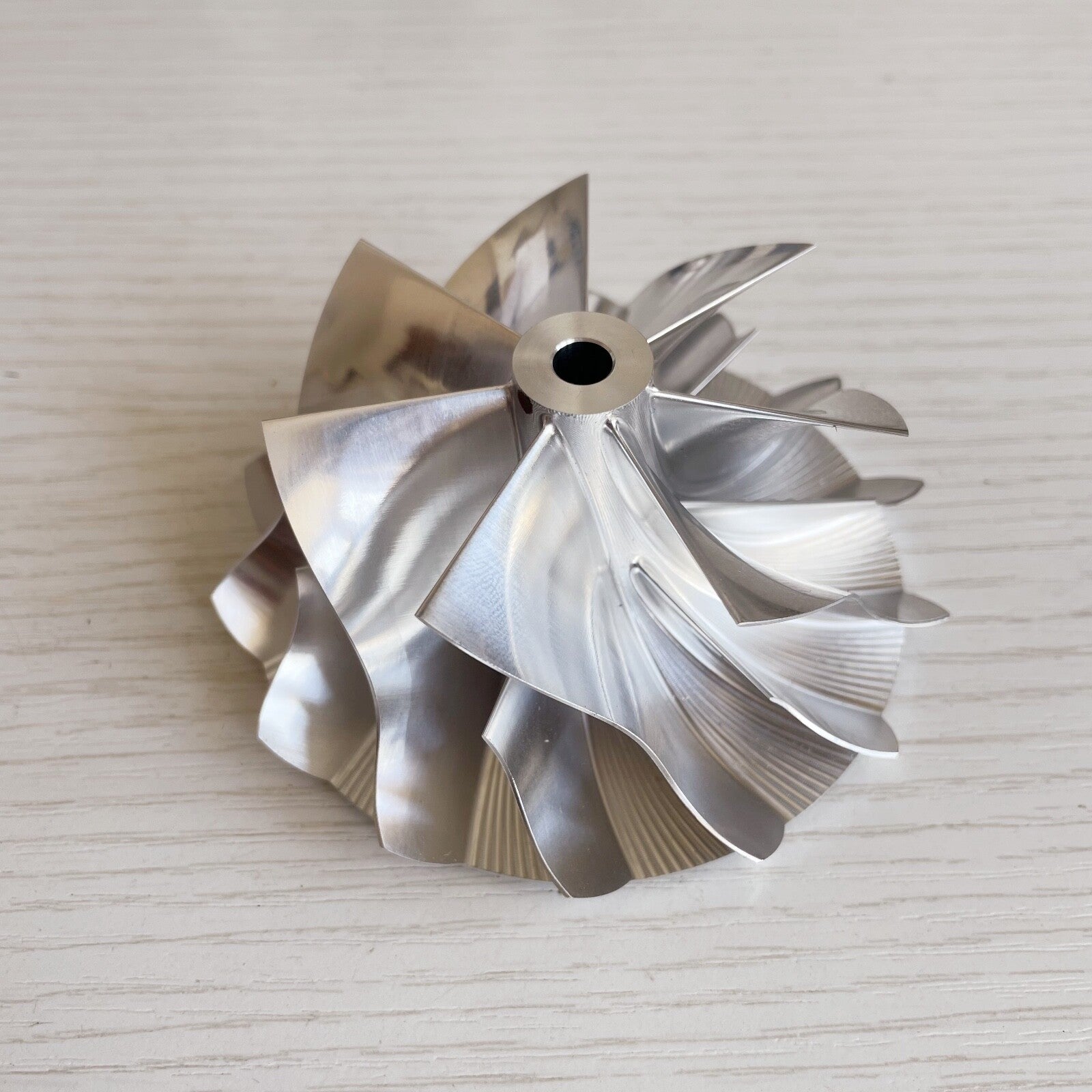 G35-1050 68.07/84.45 mm 7+7 Blade Performance Turbine Blank Compressor Wheel