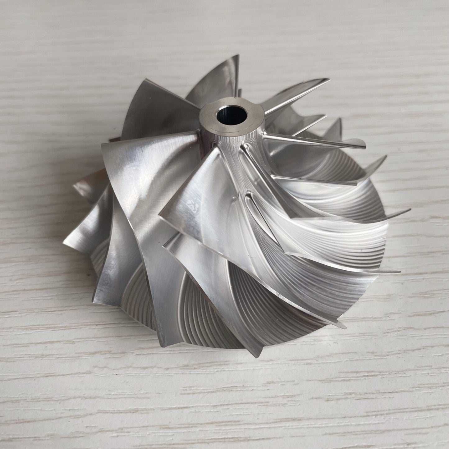 TD05H Forward-curving 57.69/78.00 mm 7+7 blade high-performance billet compressor wheel