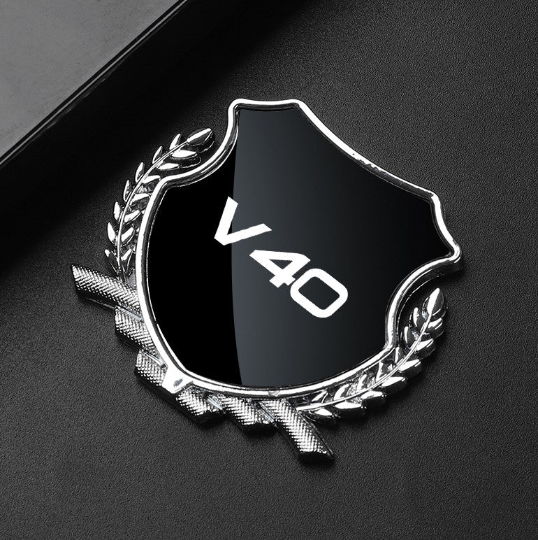 Black side fender and window badge decals for Volvo XC70 cars.