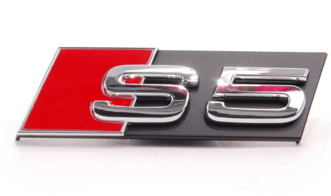 Side fender badge decals for Cadillac ATS, DTS, and SRX, silver, 6.2 cm x 2.4 cm.
